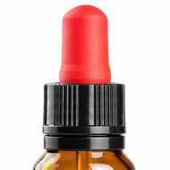 Close-up van glazen pipet met garantiesluiting op een amberkleurig pipetflesje van 15 ml